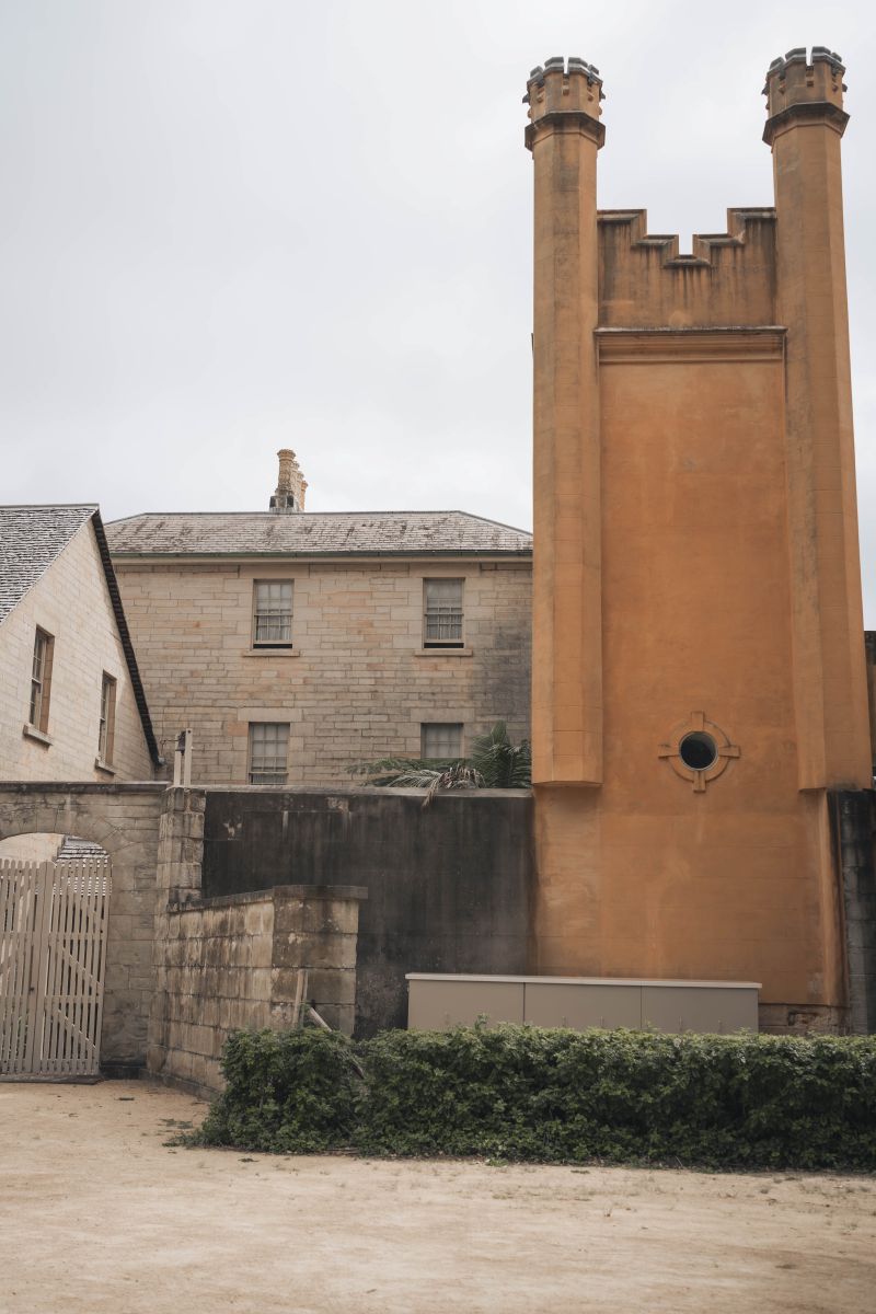Distinctive sandstone tower and heritage buildings at Vaucluse House estate in Sydney—architectural venue details for wedding photography at historic South Sydney mansion