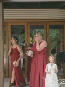 bridesmaids with tears of joy watching the bride in her wedding dress—Japanese documentary wedding photographer Sydney capturing authentic emotional moments and genuine reactions